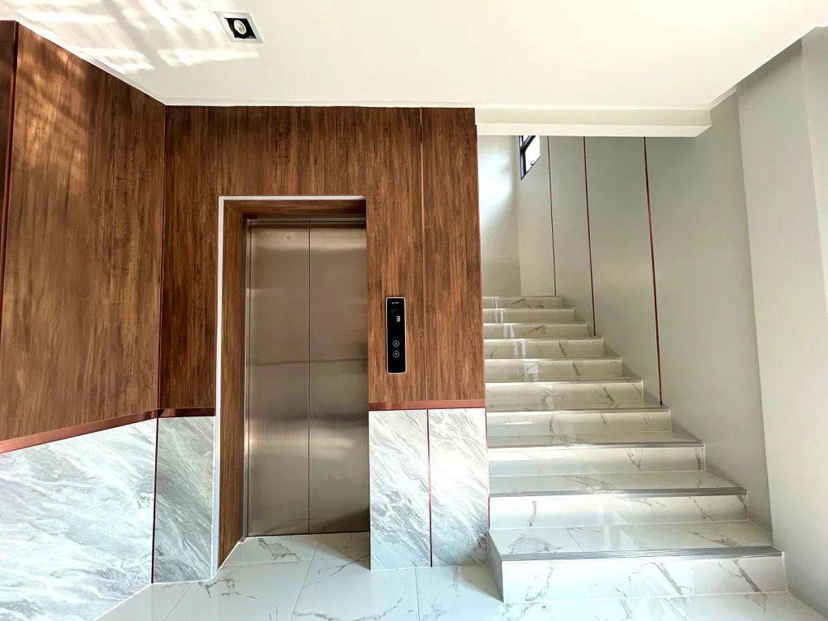 Room details showing TV and refrigerator